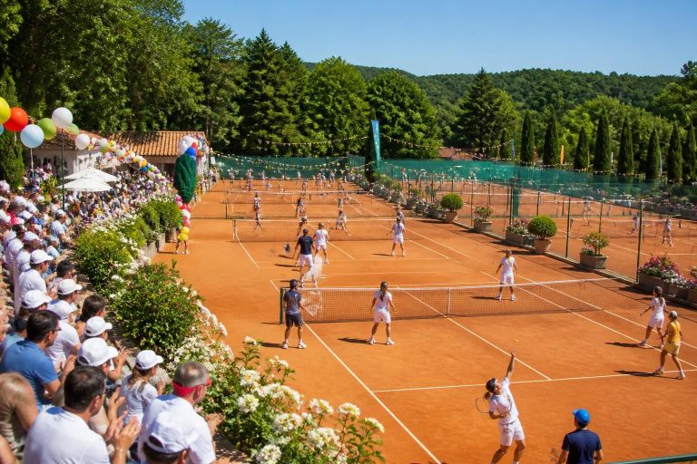 blausasc tennis club marks its 100th anniversary with a grand open tournament featuring over 100 players, celebrating a century of passion and community in tennis.