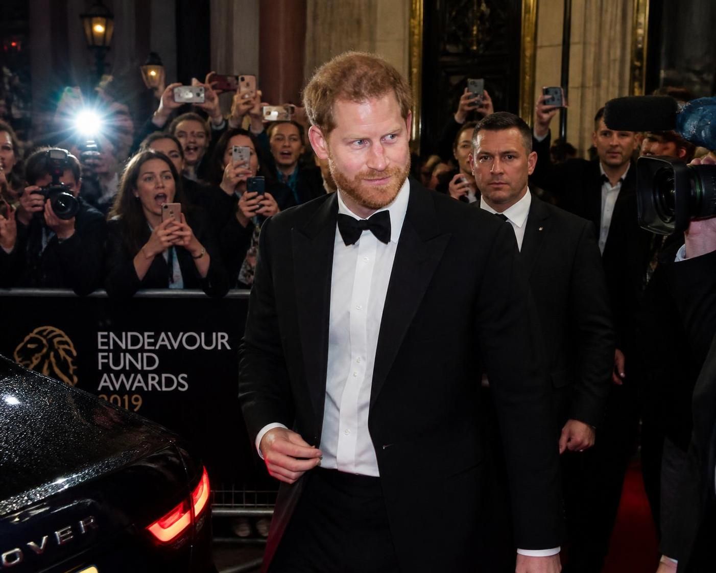 prince harry surprises fans with an unexpected appearance at a london event initially expected to be attended by meghan markle.